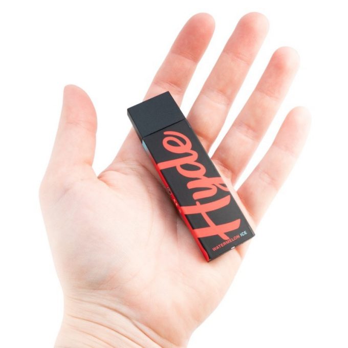 person holding disposable vape