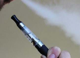 man vaping e-cigarette