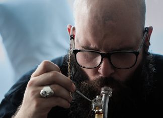 man using dab rig
