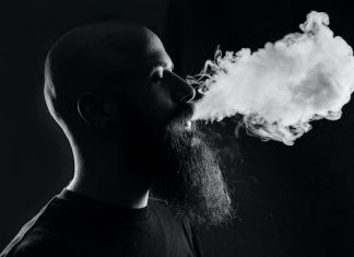 bearded man vaping