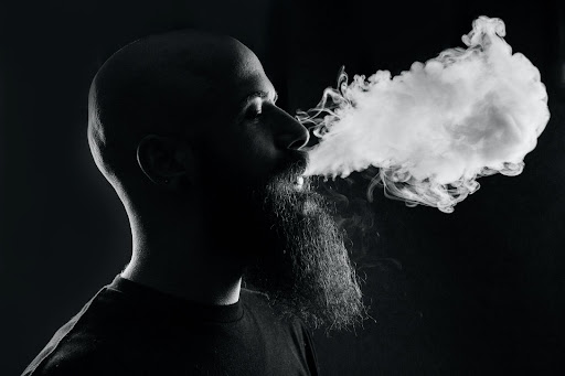 bearded man vaping