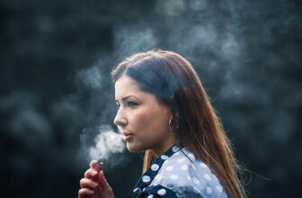 Woman Vaping Disposable